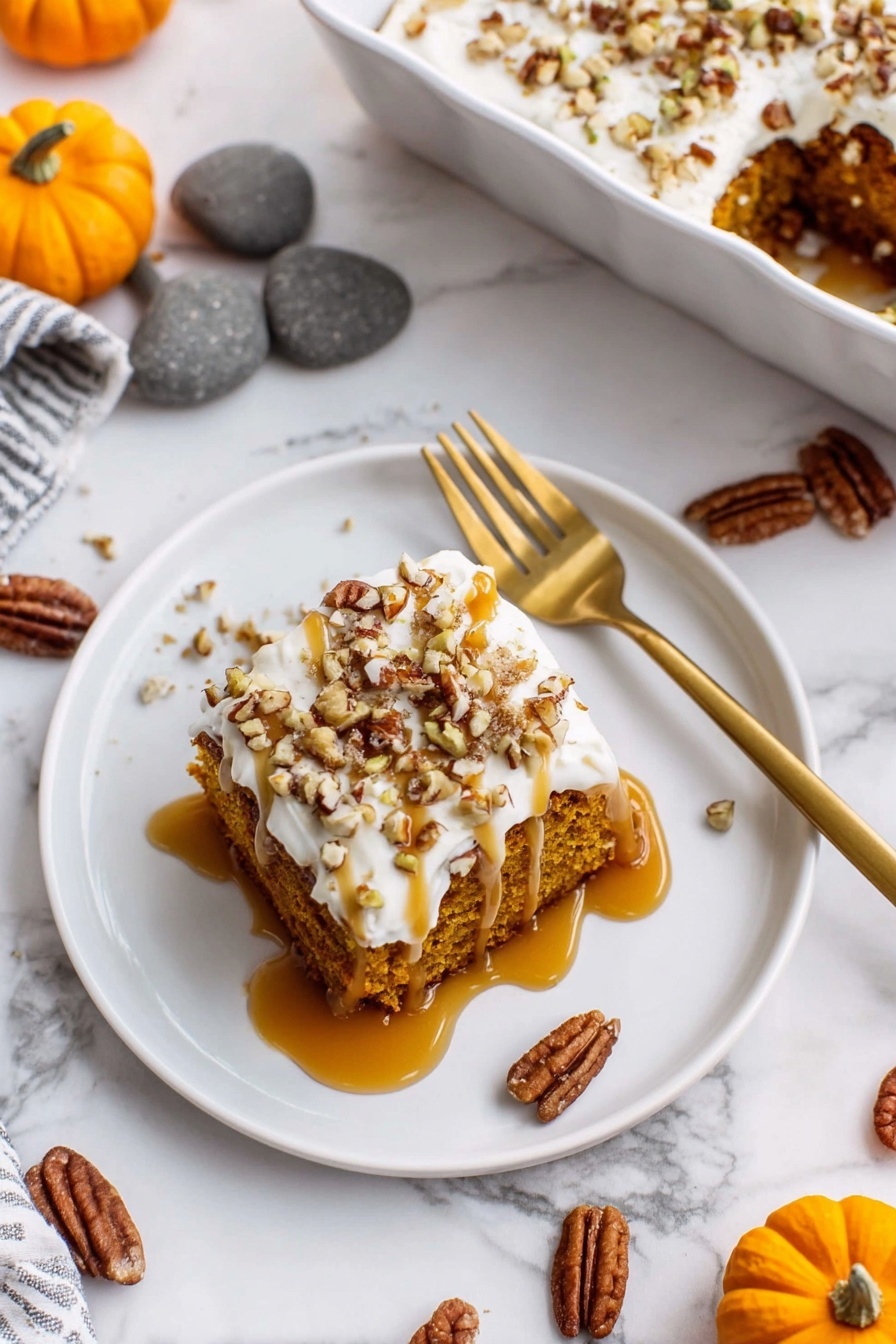 A square piece of orange-brown cake sits on a white plate with speckles. The cake has two layers: a thick, moist bottom layer and a thick white cream layer on top. The cream is sprinkled with small pieces of pecans and it is drizzled with light brown caramel sauce that also pools on the plate. Around the cake on the plate are whole and broken pecans. The plate is stacked on two more similar white plates. The background is a white marbled surface, and behind the plate, part of a white baking dish with more cake is visible. photo taken with an iphone --ar 2:3 --v 7
