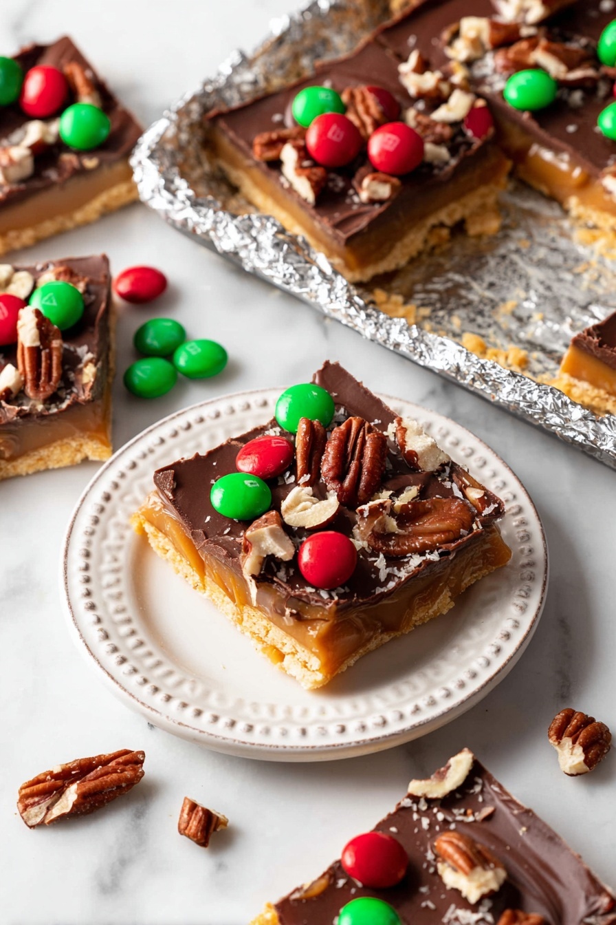 The image shows a close-up of three pieces of chocolate pecan bark stacked on a white plate with brown speckled edges. The layered bark pieces have a rough, golden-brown base topped with a thick, smooth dark chocolate layer. Scattered on top of the chocolate are whole and broken pecan nuts in various shades of brown. Some pecan pieces are placed around the plate, adding extra detail. In the background, a blurred tray holds more pieces of the bark on a white marbled surface. Photo taken with an iphone --ar 2:3 --v 7