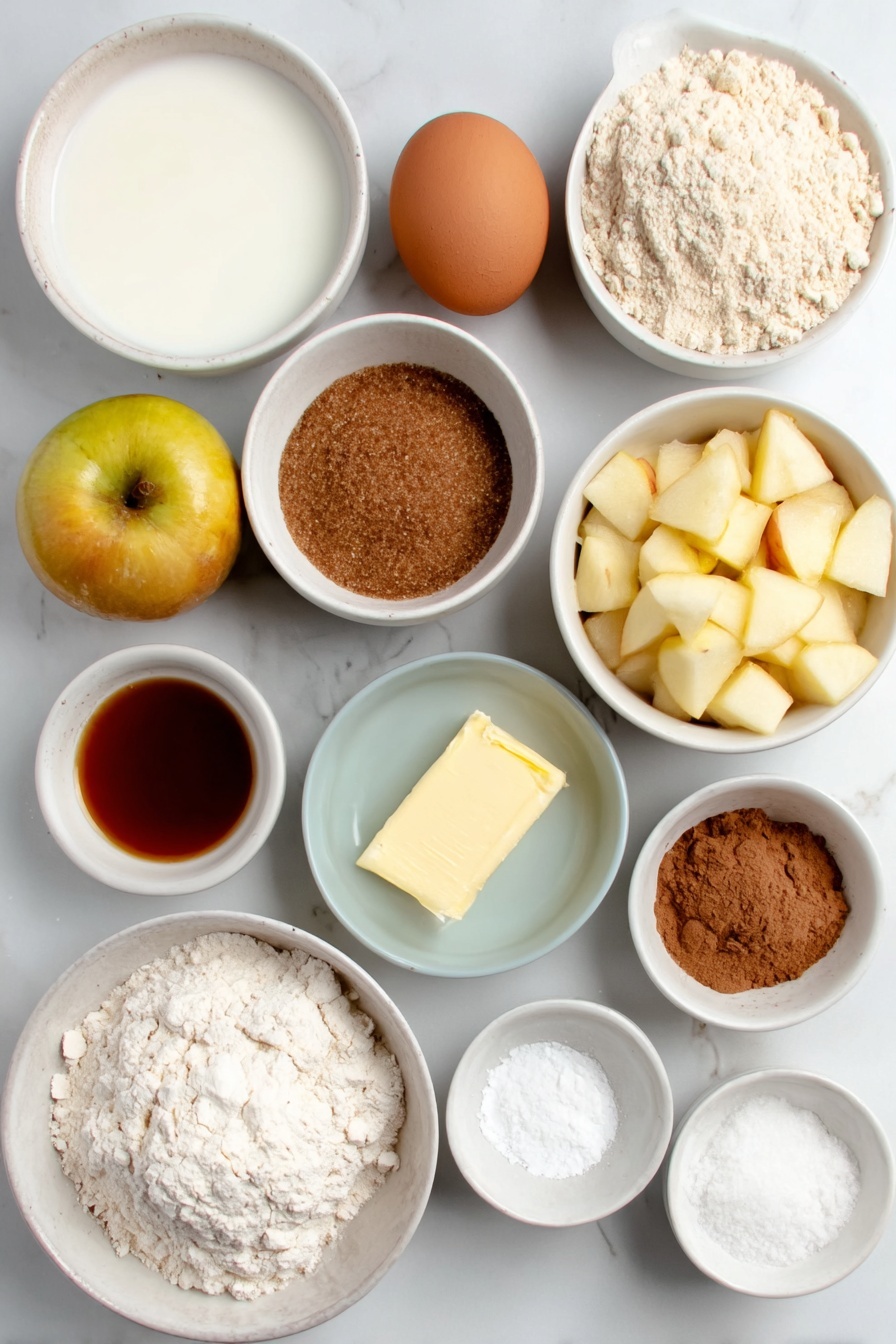 Flat lay of a small white ceramic bowl of warm milk, a quarter stick of salted butter, a mound of all-purpose flour on a white ceramic plate, a small white ceramic bowl of active dry yeast granules, a small white ceramic bowl filled with brown sugar, a pinch of salt in a tiny white ceramic bowl, a small white ceramic bowl of apple cider, one large whole brown egg with a clean shell, diced fresh peeled apples on a white ceramic plate, a small white ceramic bowl of melted salted butter, a small white ceramic bowl of lemon juice, a small white ceramic bowl of vanilla extract, ground cinnamon in a small white ceramic bowl, a small white ceramic bowl of cornstarch, and powdered sugar in a small white ceramic bowl, all ingredients fresh and natural, arranged in perfect symmetry and balanced proportions, placed on a clean white marble surface, soft natural light, photo taken with an iPhone, professional food photography style, fresh ingredients, white ceramic bowls, no bottles, no duplicates, no utensils, no packaging --ar 2:3 --v 7 --p m7354615311229779997