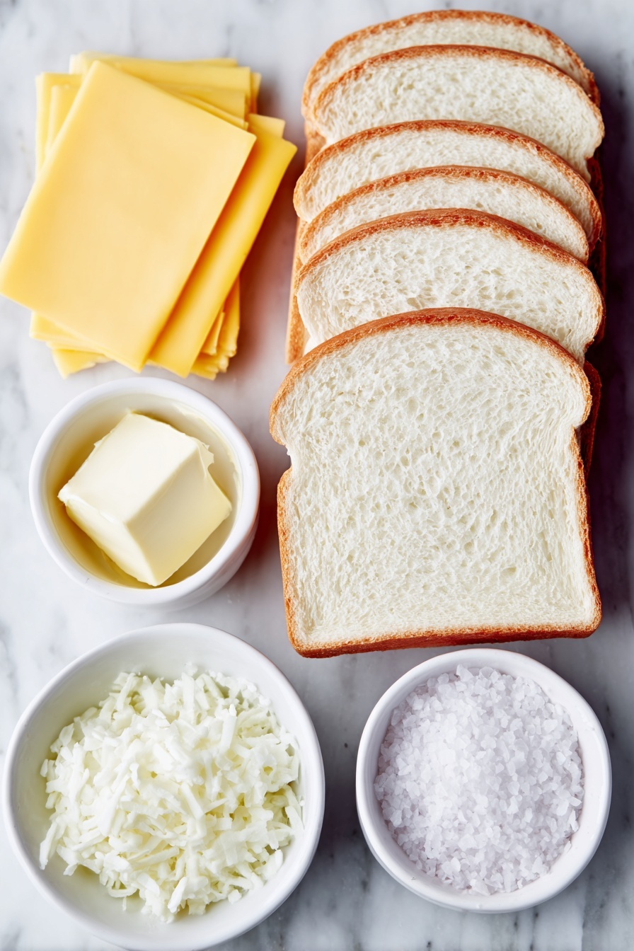 Flat lay of eight slices of fresh white sandwich bread arranged neatly, eight slices of bright yellow cheese placed flat, a small white ceramic bowl filled with softened pale yellow butter, and a small white ceramic bowl containing coarse garlic salt crystals, all ingredients fresh and natural, placed on a clean white marble surface, soft natural light, photo taken with an iPhone, professional food photography style, fresh ingredients, white ceramic bowls, no bottles, no duplicates, no utensils, no packaging --ar 2:3 --v 7 --p m7354615311229779997