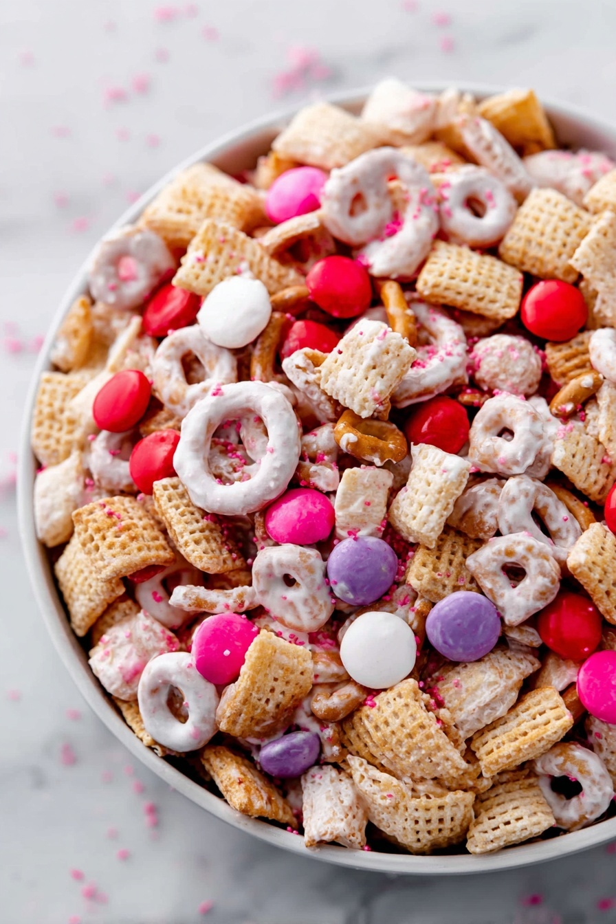 A white bowl shows five different snacks in separate sections. Starting from the top left, there are pink and red candy-coated chocolates, next to that is a pile of small round cereal loops in light brown color occupying the center top. To the right, square light brown cereals with a woven texture fill the space. Below the chocolates at the bottom left are smaller square cereals in pale beige color. The bottom right section holds twisted pretzels in golden brown. A wooden spoon with a round bowl is placed diagonally on the right side, partly resting on the woven cereal and pretzels. The bowl is on a white marbled surface. Photo taken with an iphone --ar 2:3 --v 7